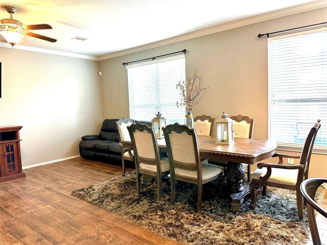 3110 Balch Springs Ln, Katy, TX 77449 - dining space featuring wood finished floors, ornamental molding, a ceiling fan, and baseboards