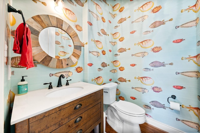 6 Compass Cir, Galveston, TX 77554 - bathroom featuring toilet and vanity