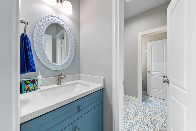 6 Compass Cir, Galveston, TX 77554 - bathroom featuring tile patterned flooring, vanity, and baseboards