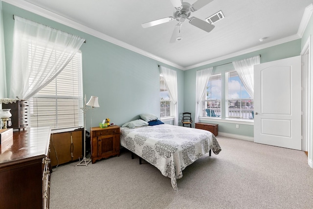 6 Compass Cir, Galveston, TX 77554 - bedroom featuring light colored carpet, visible vents, and crown molding