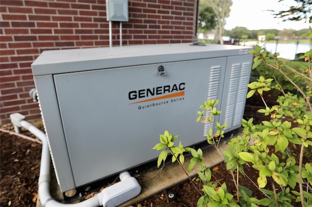 exterior details with a power unit and brick siding
