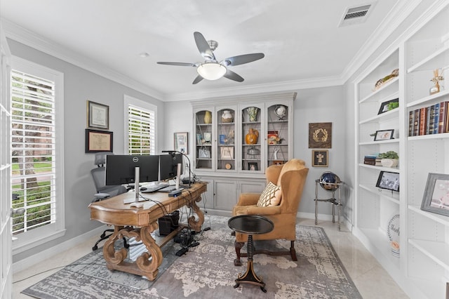 office area featuring crown molding, baseboards, ceiling fan, and visible vents