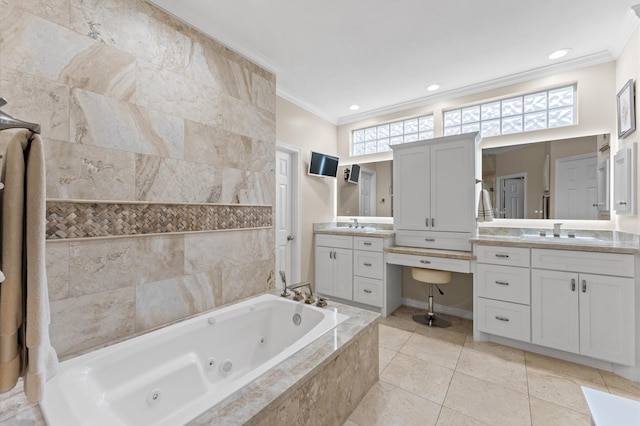 bathroom with crown molding, a whirlpool tub, tile patterned floors, and vanity