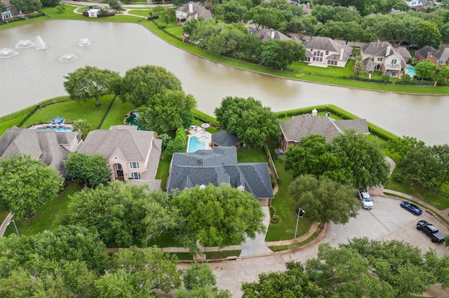 aerial view featuring a water view and a residential view
