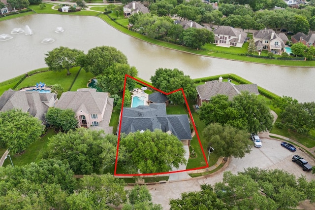 aerial view featuring a water view and a residential view