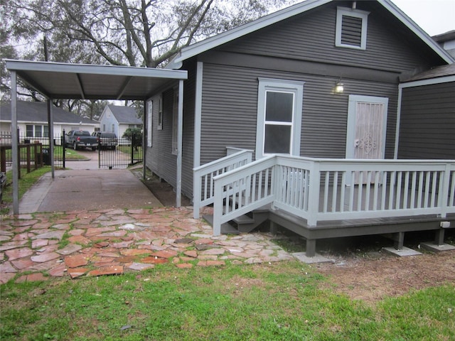 exterior space with fence and a deck