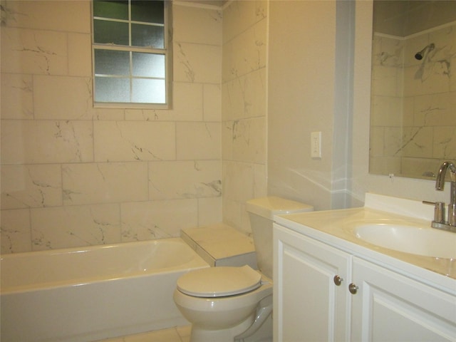 full bathroom with toilet and vanity