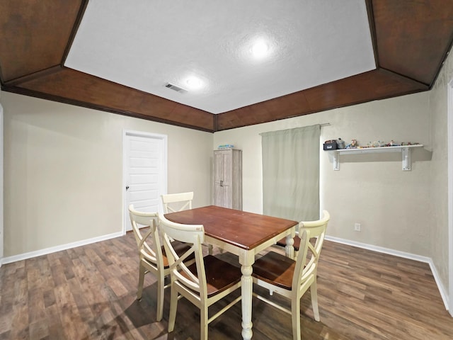 dining room with visible vents, baseboards, recessed lighting, and dark wood-type flooring