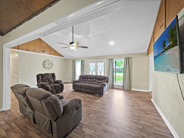 living room featuring vaulted ceiling, baseboards, recessed lighting, a ceiling fan, and wood finished floors