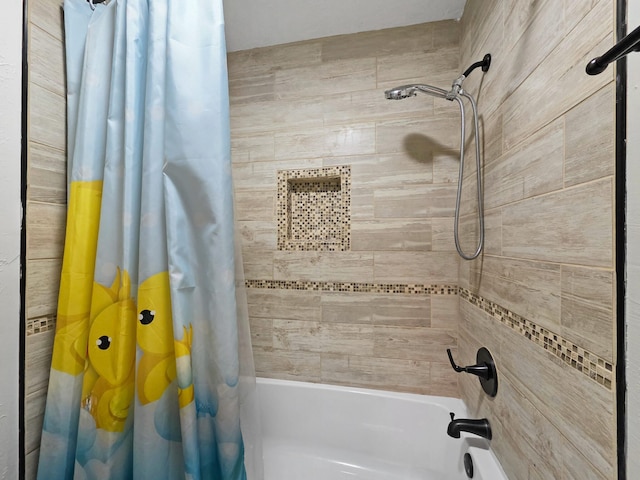 bathroom featuring shower / bath combo
