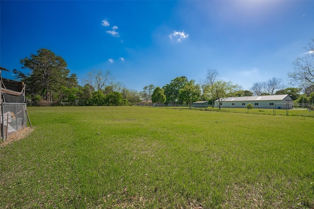 view of yard with fence