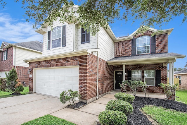 1722 Caldbeck Ln, Fresno, TX 77545 - traditional-style house featuring a garage, covered porch, driveway, and brick siding