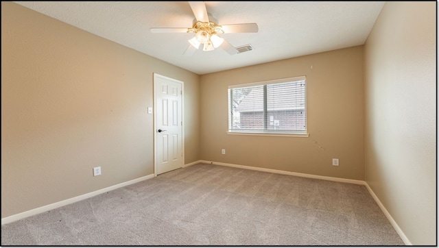 1814 S Everglades Dr, Deer Park, TX 77536 - unfurnished room featuring light carpet, a ceiling fan, and baseboards