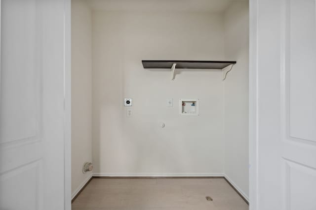 clothes washing area featuring laundry area, electric dryer hookup, hookup for a washing machine, light wood-style flooring, and baseboards