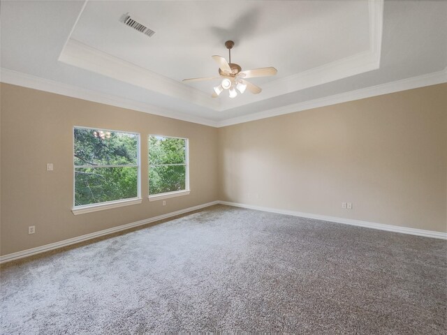 12620 Briar Patch Rd, Houston, TX 77077 - unfurnished room with carpet flooring, visible vents, ceiling fan, crown molding, and a raised ceiling