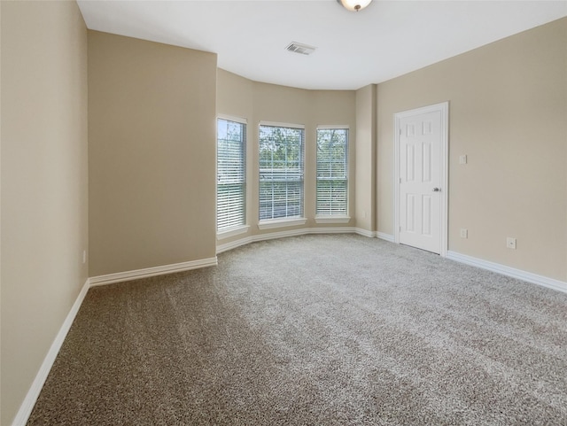 12620 Briar Patch Rd, Houston, TX 77077 - empty room featuring carpet, visible vents, and baseboards