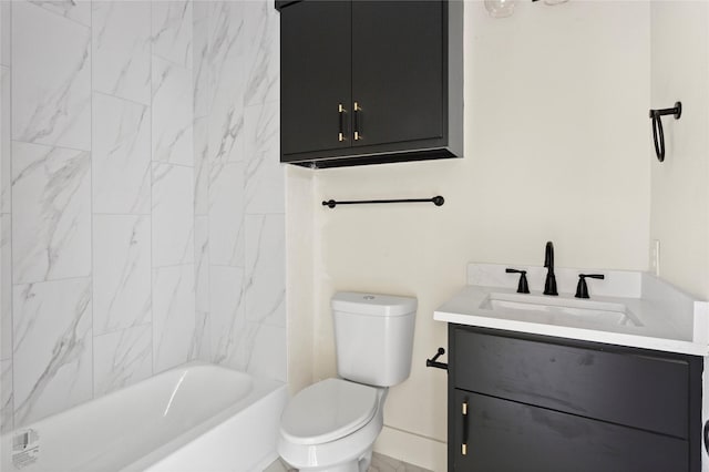 bathroom with toilet, vanity, and washtub / shower combination