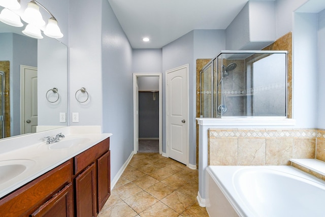 1106 Windsor Chase Ln, Spring, TX 77373 - full bath with a stall shower, a bath, double vanity, baseboards, and a spacious closet