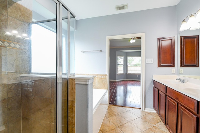 1106 Windsor Chase Ln, Spring, TX 77373 - full bath with a garden tub, a shower stall, double vanity, and tile patterned flooring