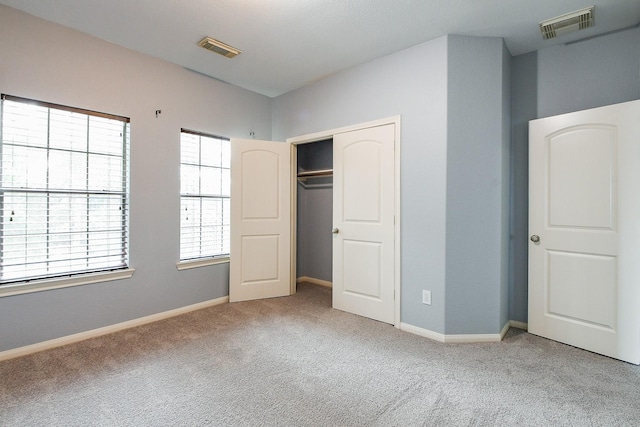 1106 Windsor Chase Ln, Spring, TX 77373 - unfurnished bedroom featuring carpet floors, a closet, and baseboards