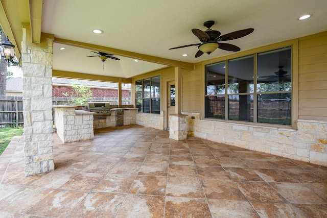 1106 Windsor Chase Ln, Spring, TX 77373 - view of patio with an outdoor kitchen, a ceiling fan, fence, and area for grilling