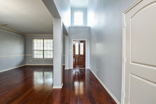 1106 Windsor Chase Ln, Spring, TX 77373 - entrance foyer with hardwood / wood-style floors, ornamental molding, a textured wall, and baseboards