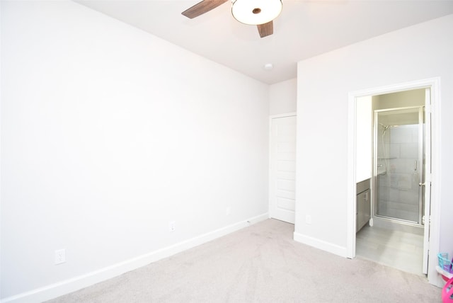 unfurnished bedroom featuring baseboards, a ceiling fan, and carpet flooring