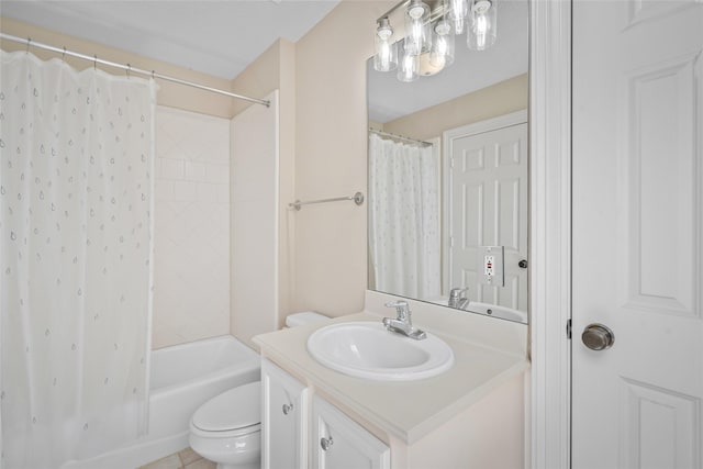 full bathroom with vanity, toilet, and shower / bath combo