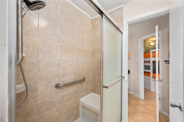 9520 Seawall Blvd Unit 226, Galveston, TX 77554 - full bathroom featuring tile patterned flooring and a shower stall