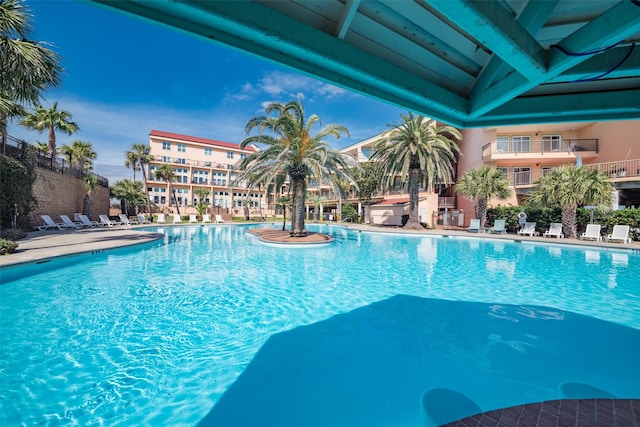 9520 Seawall Blvd Unit 226, Galveston, TX 77554 - pool featuring a patio area and fence