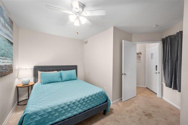 9520 Seawall Blvd Unit 226, Galveston, TX 77554 - bedroom with baseboards, a ceiling fan, visible vents, and carpet