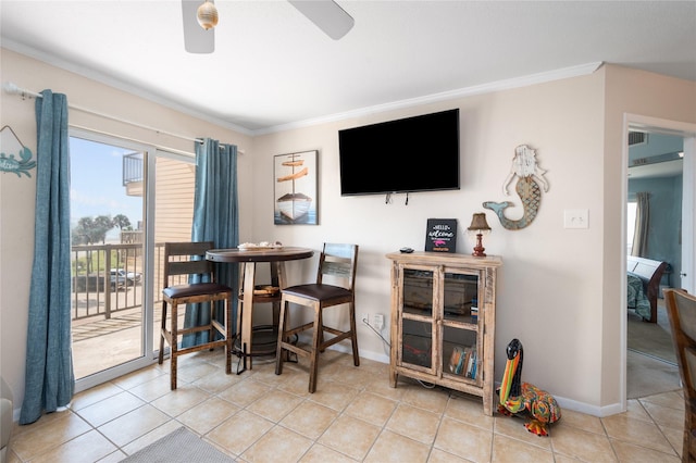 9520 Seawall Blvd Unit 226, Galveston, TX 77554 - tiled dining area featuring a ceiling fan, baseboards, and ornamental molding