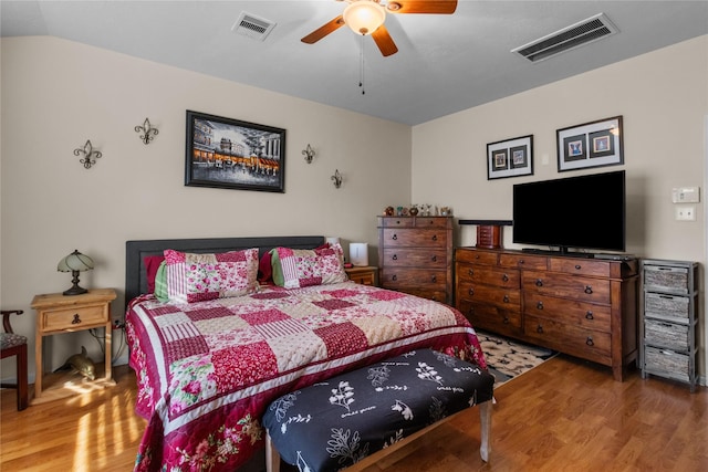 17031 Pelorus Way, Crosby, TX 77532 - bedroom featuring a ceiling fan, wood finished floors, and visible vents