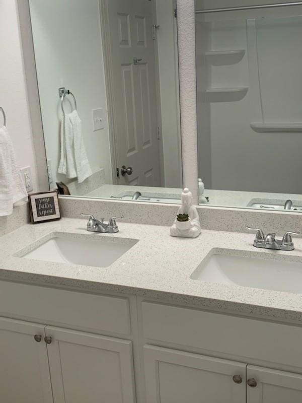 4533 Rosemont St, Houston, TX 77051 - bathroom with double vanity and a sink