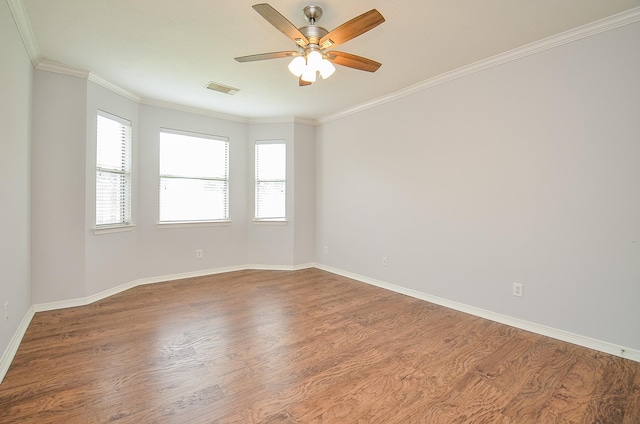 3911 Fallsbrook Ct, Sugar Land, TX 77479 - spare room featuring baseboards, visible vents, wood finished floors, ceiling fan, and ornamental molding