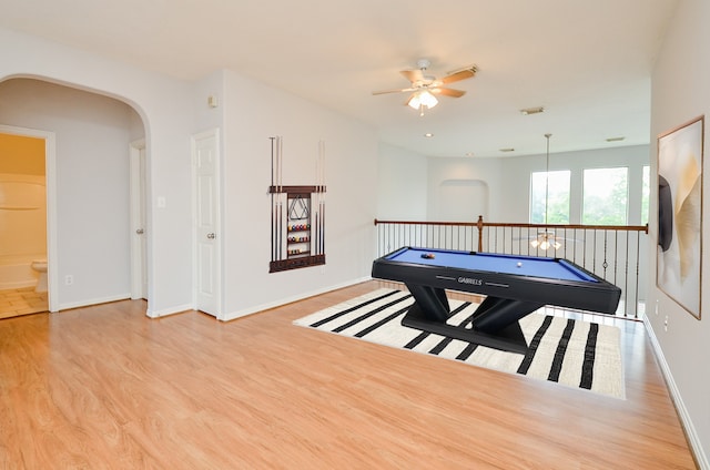3911 Fallsbrook Ct, Sugar Land, TX 77479 - rec room featuring billiards, wood finished floors, a ceiling fan, arched walkways, and baseboards
