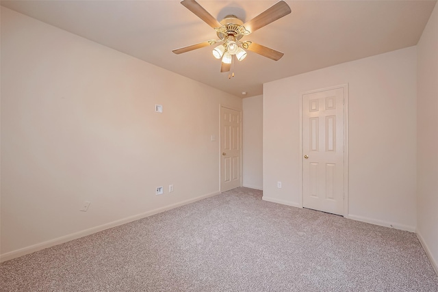 unfurnished bedroom with light carpet, baseboards, and ceiling fan