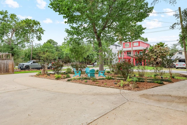 224 Clear Lake Rd, Clear Lake Shores, TX 77565 - view of yard featuring concrete driveway