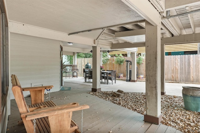224 Clear Lake Rd, Clear Lake Shores, TX 77565 - view of patio with a fenced backyard, outdoor dining space, and a deck