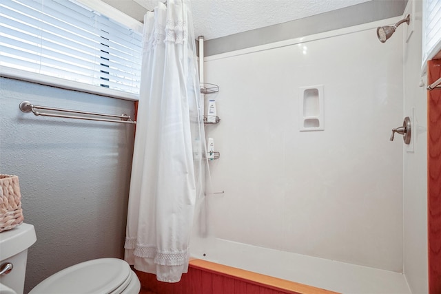 224 Clear Lake Rd, Clear Lake Shores, TX 77565 - full bathroom with a shower with shower curtain and toilet