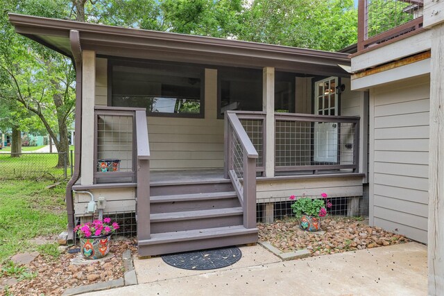 224 Clear Lake Rd, Clear Lake Shores, TX 77565 - doorway to property featuring fence