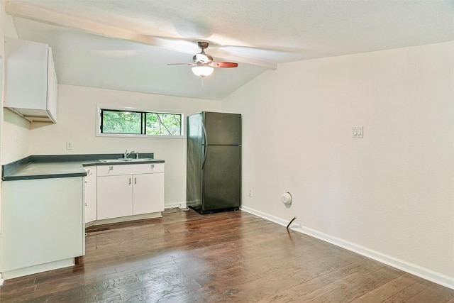 224 Clear Lake Rd, Clear Lake Shores, TX 77565 - kitchen featuring a sink, vaulted ceiling with beams, ceiling fan, dark wood-type flooring, and freestanding refrigerator