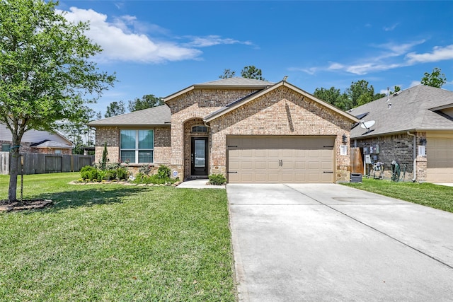 22086 Sun Haven Ln, Porter, TX 77365 - view of front of home with a front lawn, concrete driveway, fence, brick siding, and a garage