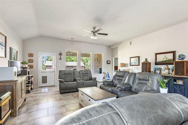 22086 Sun Haven Ln, Porter, TX 77365 - living area featuring lofted ceiling, visible vents, ceiling fan, and light tile patterned floors