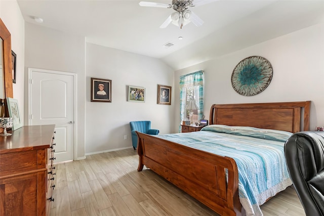 22086 Sun Haven Ln, Porter, TX 77365 - bedroom with ceiling fan, light wood finished floors, baseboards, lofted ceiling, and visible vents