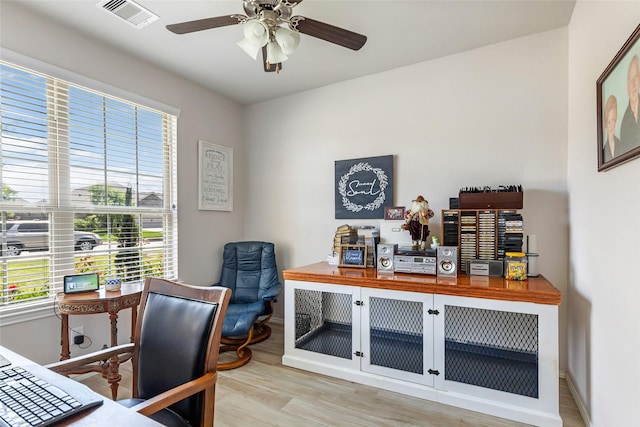 22086 Sun Haven Ln, Porter, TX 77365 - office area with plenty of natural light, visible vents, a ceiling fan, and wood finished floors