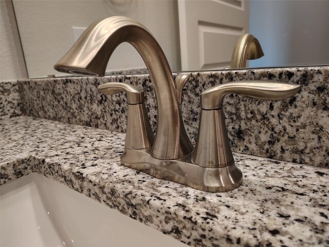 2 Gemstone Ct, Angleton, TX 77515 - bathroom view of tasteful backsplash and a sink