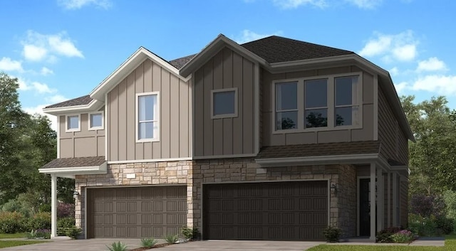 multi unit property with roof with shingles, stone siding, concrete driveway, a garage, and board and batten siding