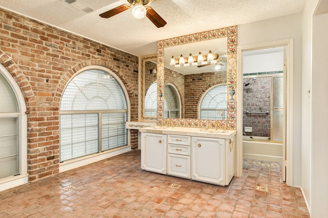 2610 Gerol Ct, Galveston, TX 77551 - full bath with brick wall, enclosed tub / shower combo, a ceiling fan, and a textured ceiling