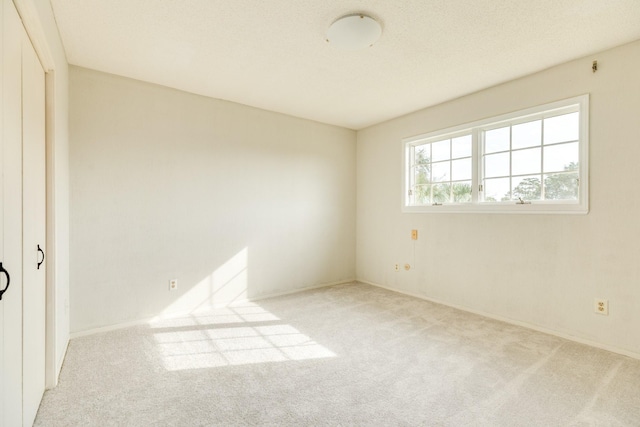 2610 Gerol Ct, Galveston, TX 77551 - unfurnished bedroom with baseboards and carpet floors